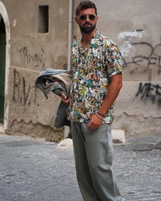 Manuel Store From The Road Resort shirt, short-sleeve rayon camp collar shirt with all-over collage print, featuring dice, playing cards, and vintage imagery.