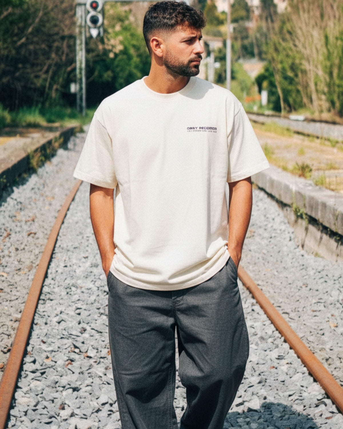 Manuel Store cream heavyweight 100% cotton t-shirt with OBEY RECORDS graphic print on front and back.