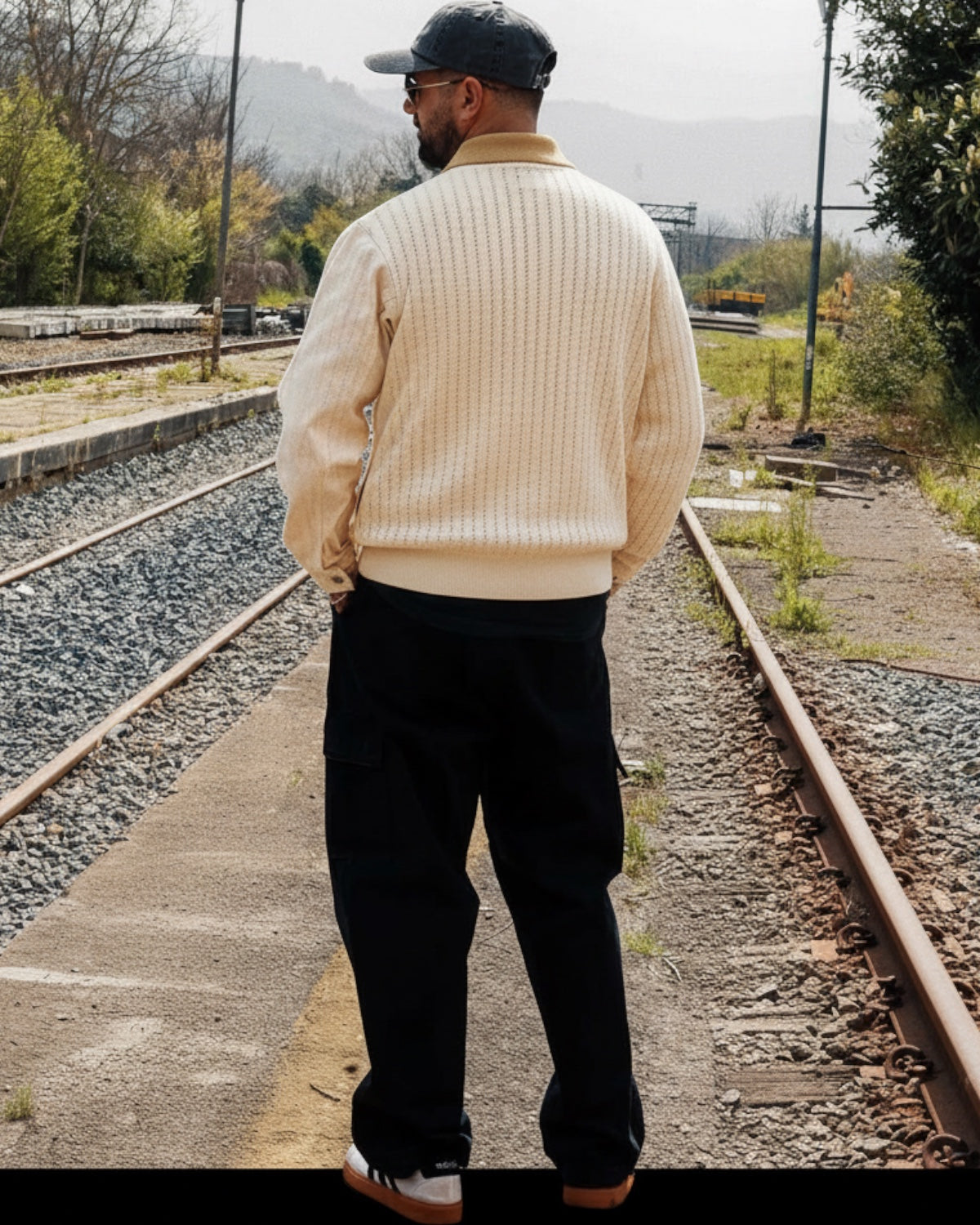 Manuel Store cream textured knit polo shirt with contrast tan collar and ribbed cuffs and hem.