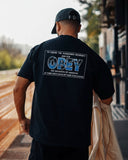 Manuel Store dark grey 100% cotton t-shirt with 'OBEY' graphic print on back.