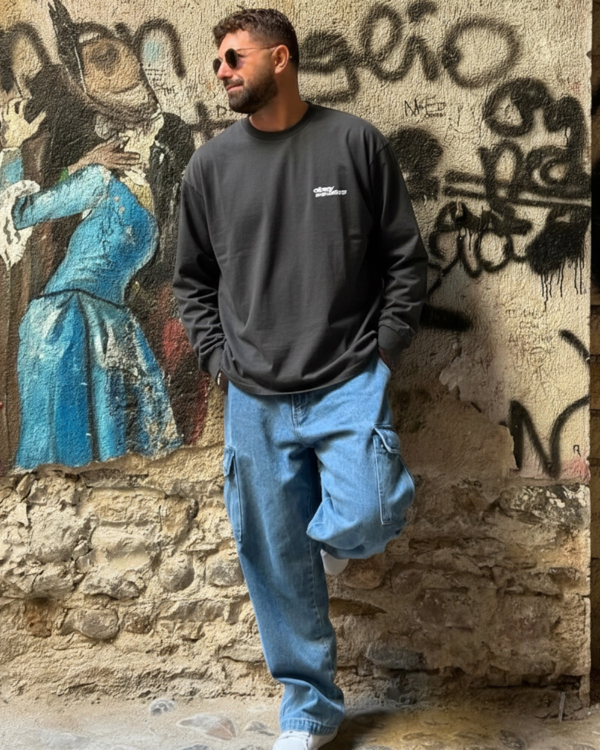 Manuel Store OBEY Studios pigment dyed charcoal grey 100% cotton long sleeve t-shirt with front and back graphic.