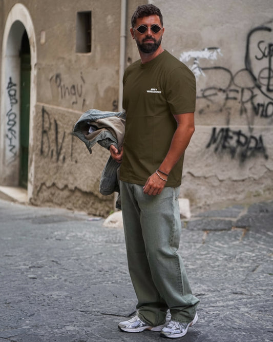 Manuel Store olive green 100% cotton relaxed fit t-shirt with white 'OBEY WORLDWIDE' graphic on front and back.