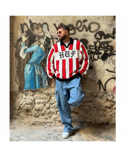 Manuel Store red and white striped knit sweater with black collar and HUF logo