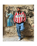 Manuel Store red and white striped knit sweater with black collar and HUF logo