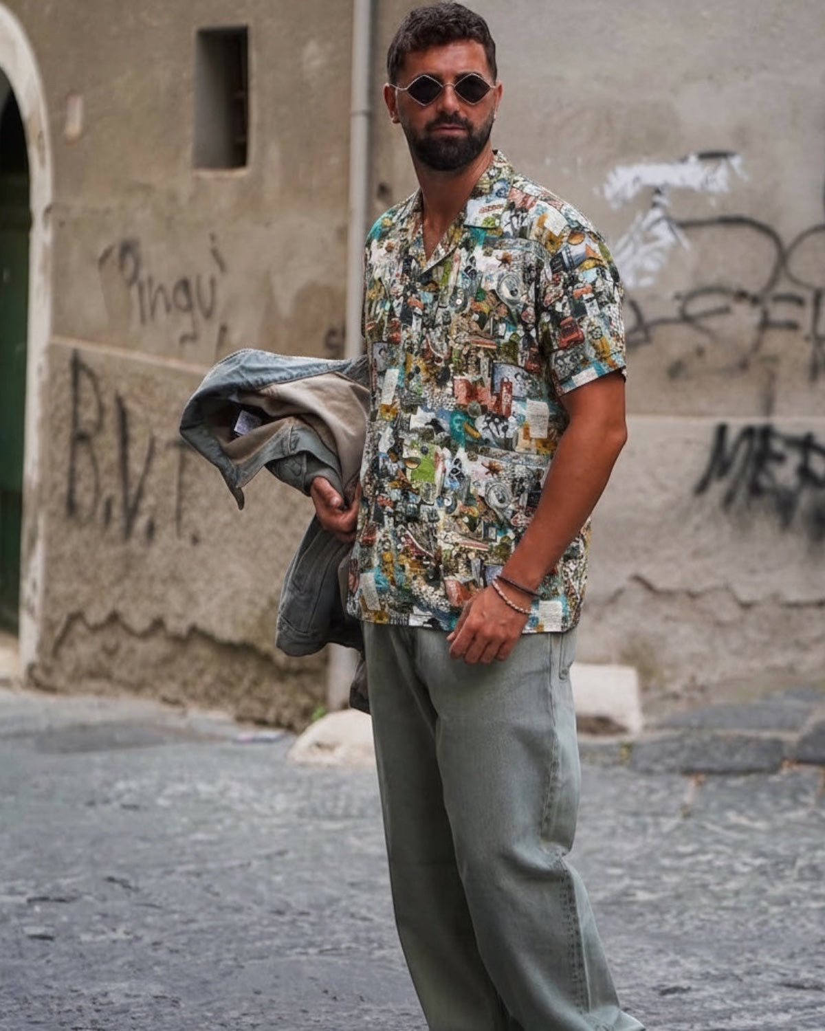 Manuel Store From The Road Resort shirt, short-sleeve rayon camp collar shirt with all-over collage print, featuring dice, playing cards, and vintage imagery.